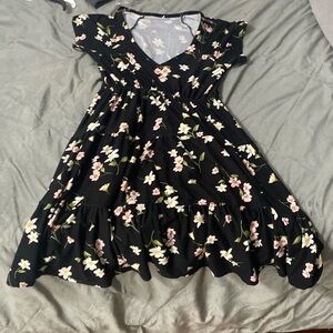 This dress is No Boundaries brand. Size Xs. And black dress with florals.